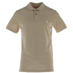 Image 1 : Polo homme Timberland piqué beige, vue de face, col polo 3 boutons et logo arbre brodé poitrine gauche — Delvale