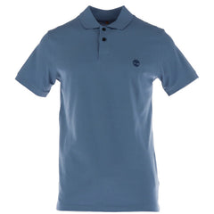 Image 1 : Polo homme Timberland en piqué coton bleu azur, vue de face avec logo arbre brodé sur la poitrine gauche et col deux boutons — Delvale