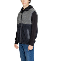 Image 3 : Détail matière sherpa et fermeture éclair du gilet sans manches Tommy Hilfiger homme bicolore gris et bleu marine — Delvale