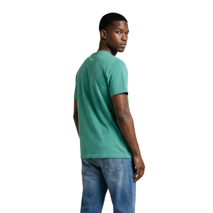 Image 3 : T-shirt Tommy Hilfiger Jeans homme vert porté, vue de profil — Delvale