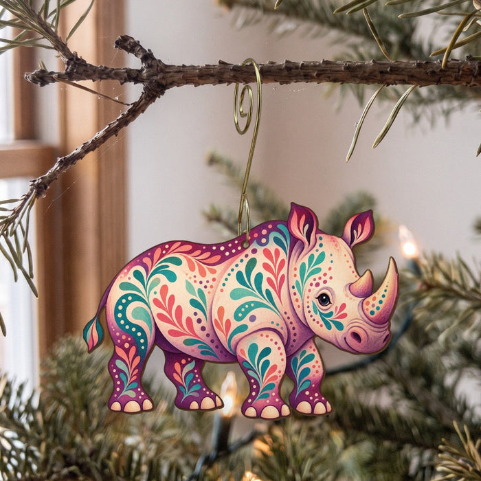 Laser-cut maple wood White Rhinoceros folk art ornament O372 hanging on a fir branch, made in USA