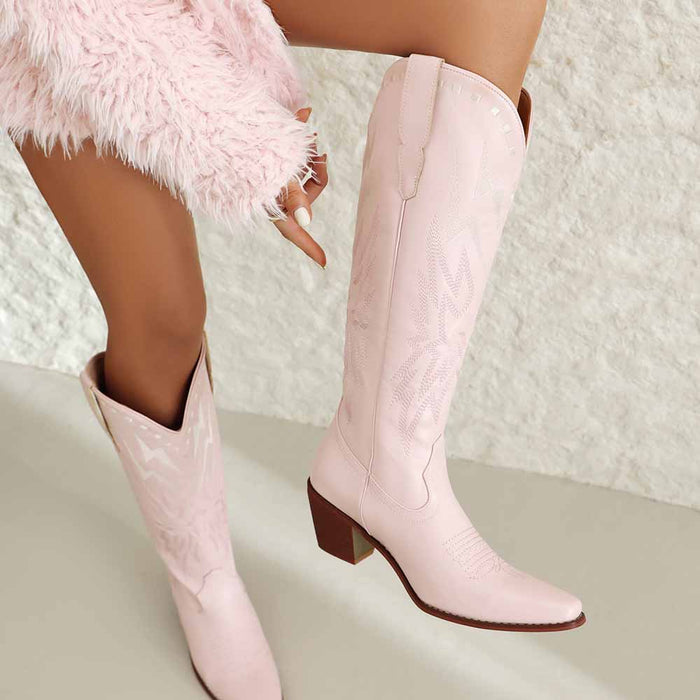 Stylish women's embroidered cowboy boots in soft pink with a modern design for fashionable outfits